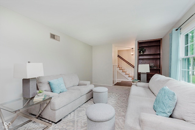 6146 Rucker Rd, Indianapolis, IN 46220 - living area with stairs and baseboards