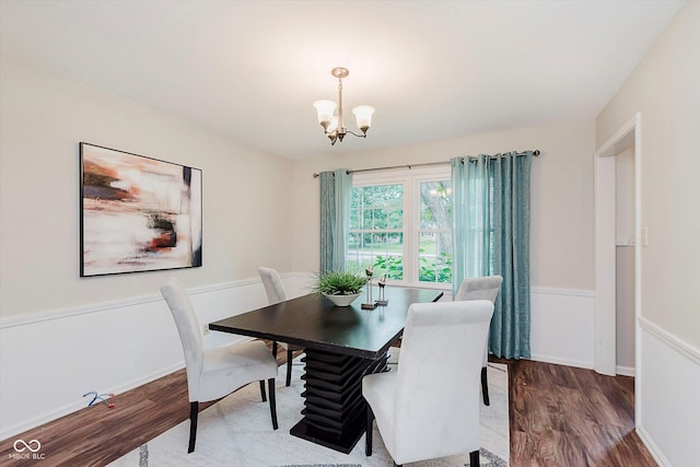 6146 Rucker Rd, Indianapolis, IN 46220 - dining area featuring wood finished floors and a chandelier