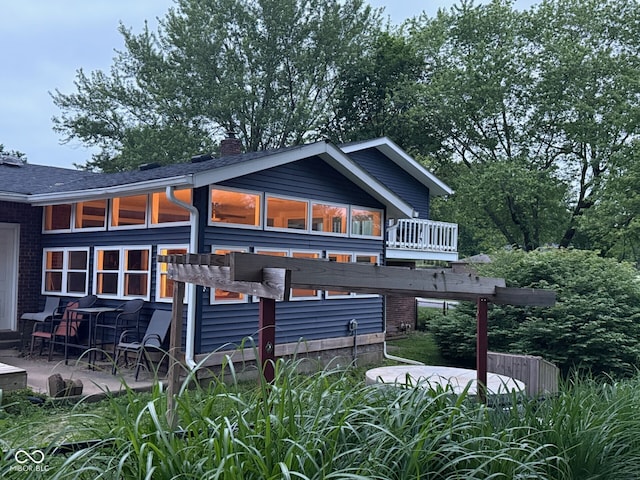 75 Byram Blvd, Martinsville, IN 46151 - rear view of property with a chimney, a patio area, and roof with shingles