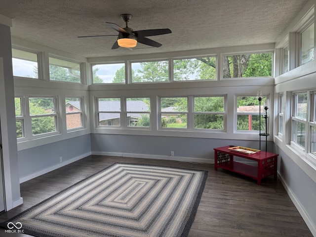 75 Byram Blvd, Martinsville, IN 46151 - unfurnished sunroom featuring a textured ceiling, wood finished floors, and baseboards