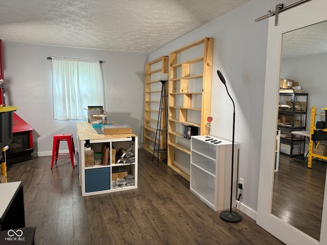 75 Byram Blvd, Martinsville, IN 46151 - dining space featuring a textured ceiling, dark wood finished floors, and baseboards