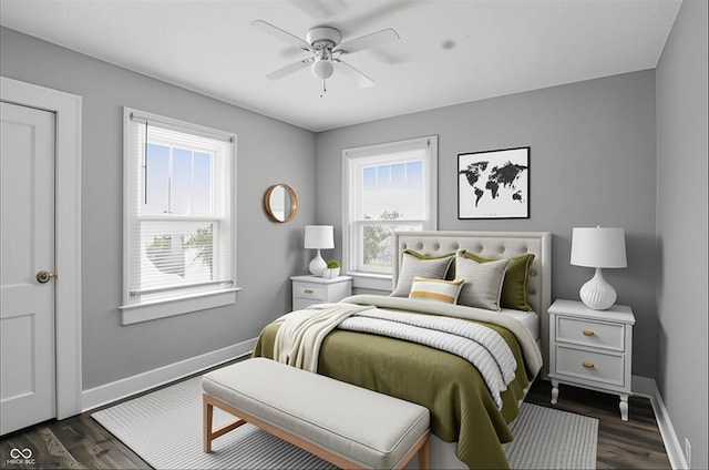 1915 Albany St, Beech Grove, IN 46107 - bedroom with multiple windows, baseboards, and dark wood-style floors