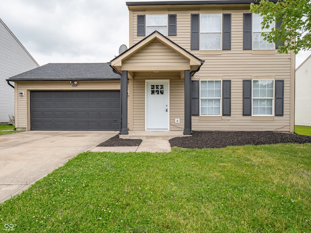 3734 Lacebark Dr, Indianapolis, IN 46235 - view of front of home with concrete driveway, a front yard, and an attached garage