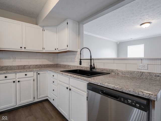 3734 Lacebark Dr, Indianapolis, IN 46235 - kitchen featuring stainless steel dishwasher, a sink, a textured ceiling, dark wood-type flooring, and crown molding