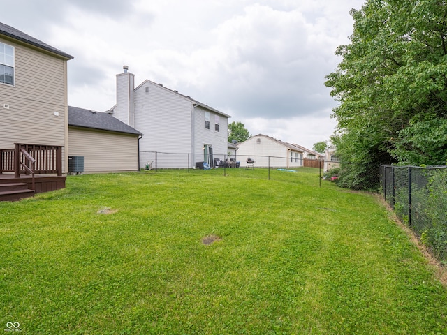 3734 Lacebark Dr, Indianapolis, IN 46235 - view of yard with central AC and a wooden deck