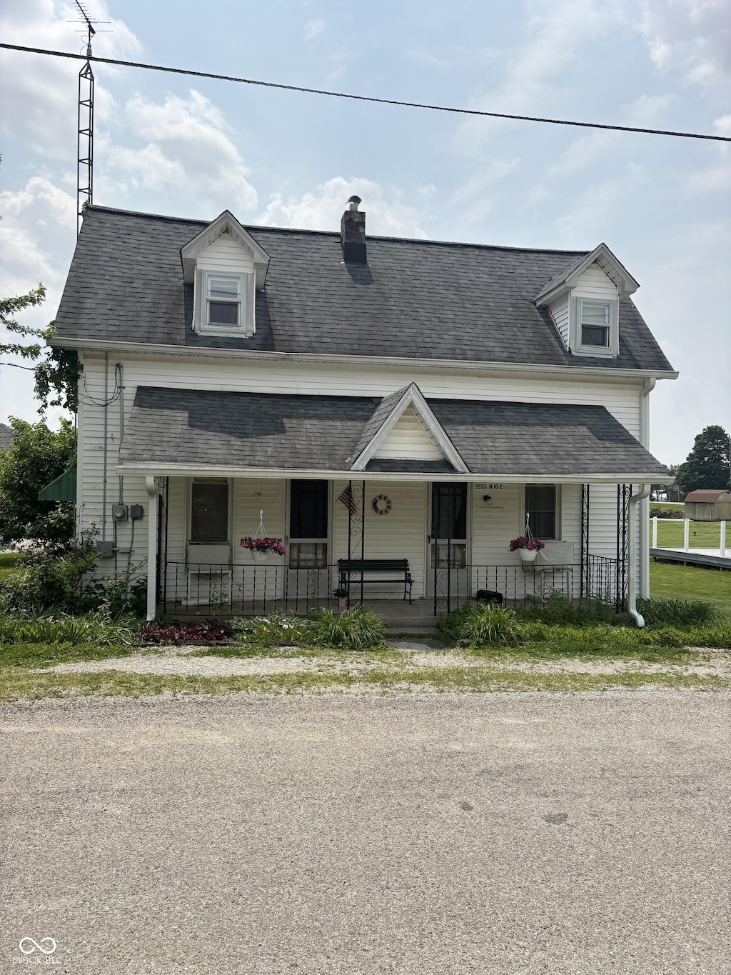 5553 N County Road 10 E, Greensburg, IN 47240 - view of front of home featuring covered porch and a shingled roof