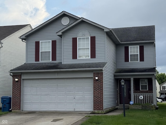 8056 Maple Stream Blvd, Indianapolis, IN 46217 - traditional-style house featuring a porch, an attached garage, concrete driveway, brick siding, and roof with shingles