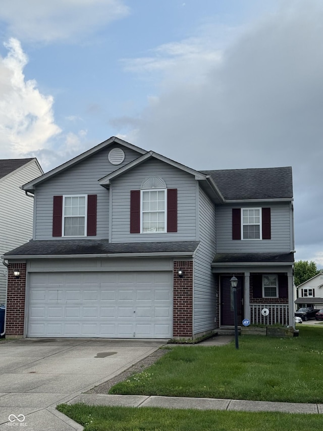 8056 Maple Stream Blvd, Indianapolis, IN 46217 - traditional-style house with a garage, concrete driveway, a porch, brick siding, and a front yard