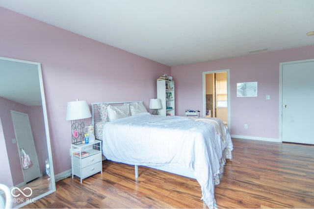 8056 Maple Stream Blvd, Indianapolis, IN 46217 - bedroom with wood finished floors and baseboards