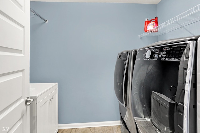 2789 W High Grove Cir, Zionsville, IN 46077 - laundry room featuring independent washer and dryer and cabinet space