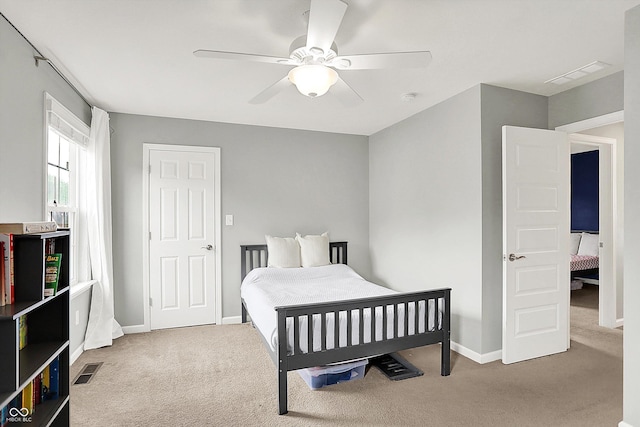 2789 W High Grove Cir, Zionsville, IN 46077 - carpeted bedroom with baseboards and a ceiling fan