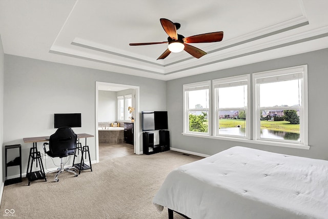 2789 W High Grove Cir, Zionsville, IN 46077 - bedroom with a raised ceiling, light colored carpet, an office area, ensuite bathroom, and a ceiling fan