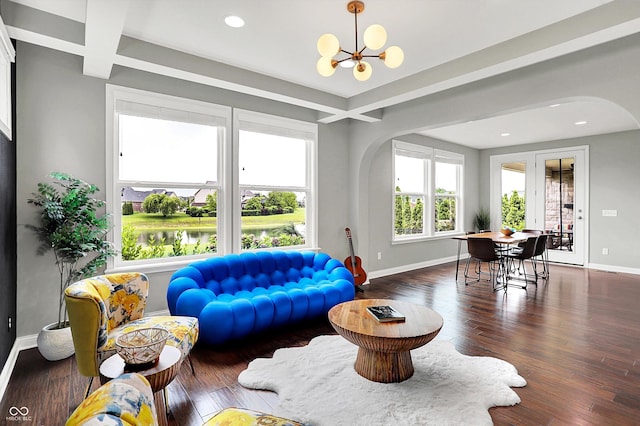 2789 W High Grove Cir, Zionsville, IN 46077 - living room with arched walkways, a chandelier, beamed ceiling, recessed lighting, and wood finished floors