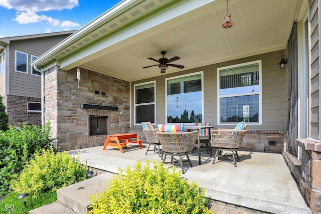 2789 W High Grove Cir, Zionsville, IN 46077 - view of patio / terrace with an outdoor stone fireplace and ceiling fan