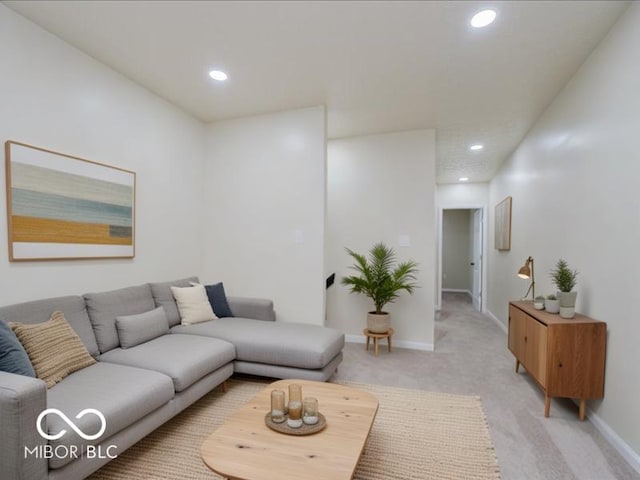 3558 N Gladstone Ave, Indianapolis, IN 46218 - living area with light colored carpet, recessed lighting, and baseboards