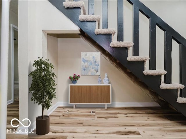 3558 N Gladstone Ave, Indianapolis, IN 46218 - stairs with wood finished floors and baseboards