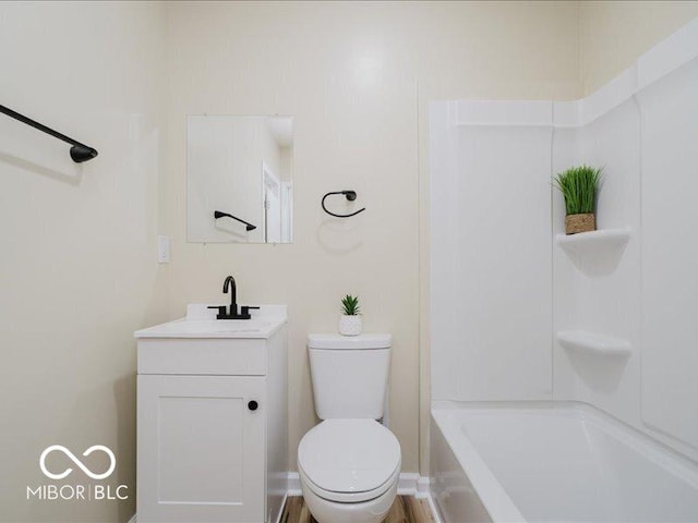 3558 N Gladstone Ave, Indianapolis, IN 46218 - bathroom featuring vanity, toilet, and shower / tub combination