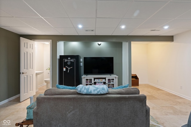 6927 Rose Tree Ct, Indianapolis, IN 46237 - living area featuring a paneled ceiling, baseboards, and recessed lighting