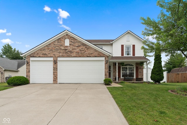 6927 Rose Tree Ct, Indianapolis, IN 46237 - traditional home with a garage, concrete driveway, brick siding, a porch, and a front lawn