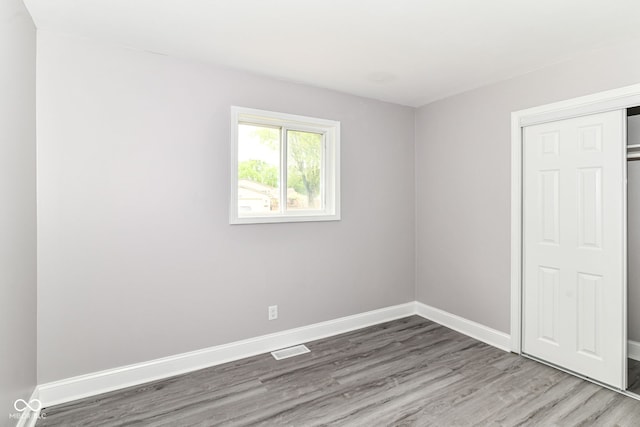 1820 Hemlock Ln, Plainfield, IN 46168 - spare room with wood finished floors and baseboards