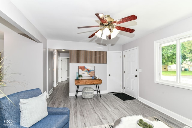 1820 Hemlock Ln, Plainfield, IN 46168 - foyer entrance featuring wood finished floors, a ceiling fan, and baseboards