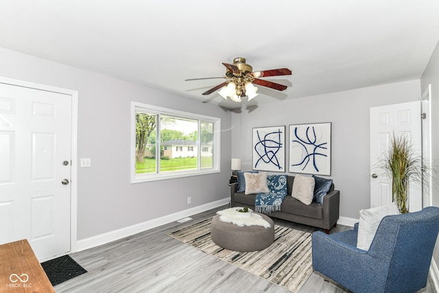 1820 Hemlock Ln, Plainfield, IN 46168 - living room with ceiling fan, baseboards, and wood finished floors