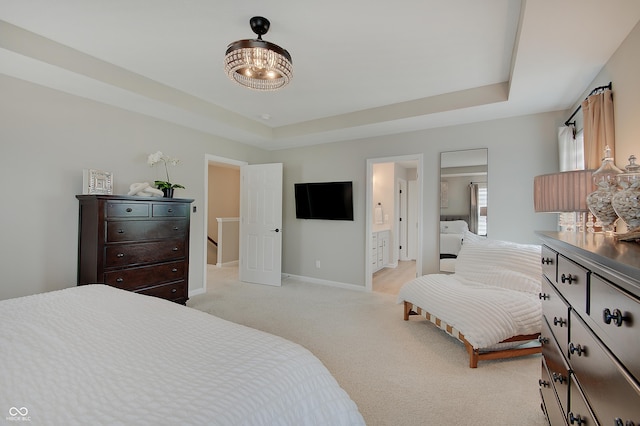 4163 Ironclad Dr, Bargersville, IN 46106 - bedroom featuring light colored carpet, a raised ceiling, and ensuite bathroom