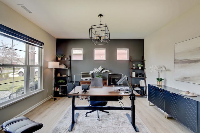 4163 Ironclad Dr, Bargersville, IN 46106 - office area with light wood-style flooring and a chandelier
