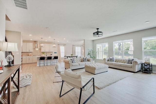 4163 Ironclad Dr, Bargersville, IN 46106 - living area with light wood-type flooring and recessed lighting