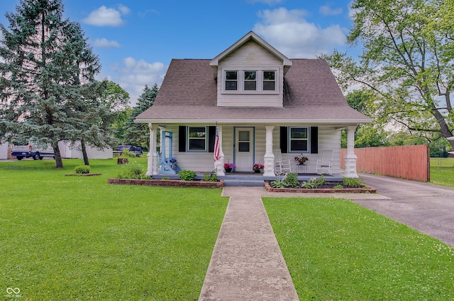 616 S Fuller Dr, Indianapolis, IN 46241 - bungalow-style home featuring a porch and roof with shingles