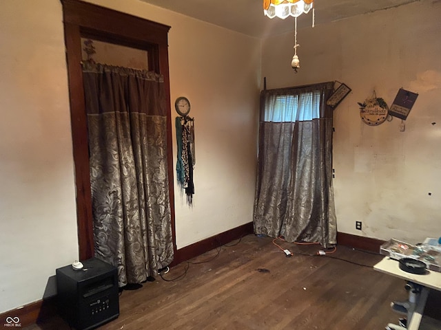 7669 W 100 N, Tipton, IN 46072 - unfurnished dining area with wood finished floors and baseboards