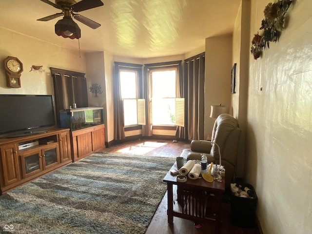 7669 W 100 N, Tipton, IN 46072 - living area with wood finished floors and ceiling fan