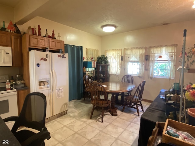 7669 W 100 N, Tipton, IN 46072 - dining space featuring a textured ceiling