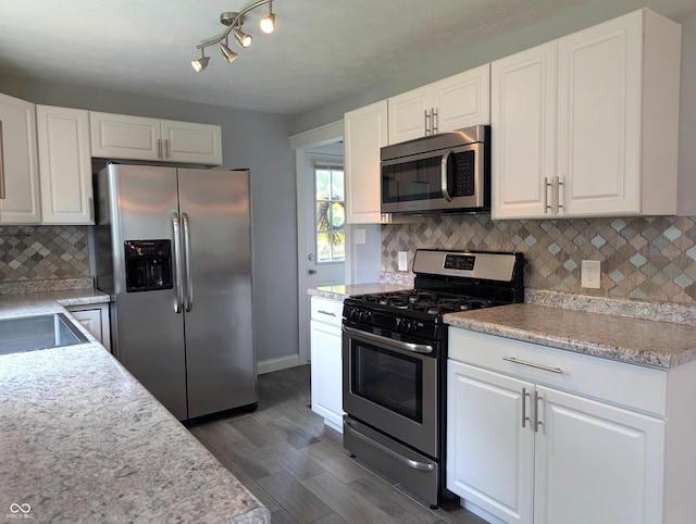 1637 Meridian St, Columbus, IN 47201 - kitchen with stainless steel appliances, light countertops, and white cabinets