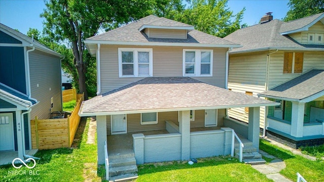 418 Eastern Ave, Indianapolis, IN 46201 - american foursquare style home with covered porch and roof with shingles