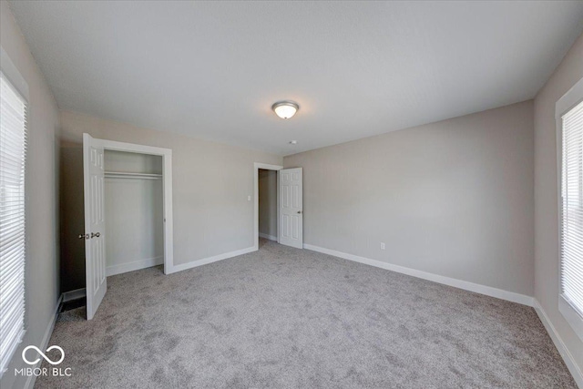 418 Eastern Ave, Indianapolis, IN 46201 - unfurnished bedroom featuring carpet flooring and a closet