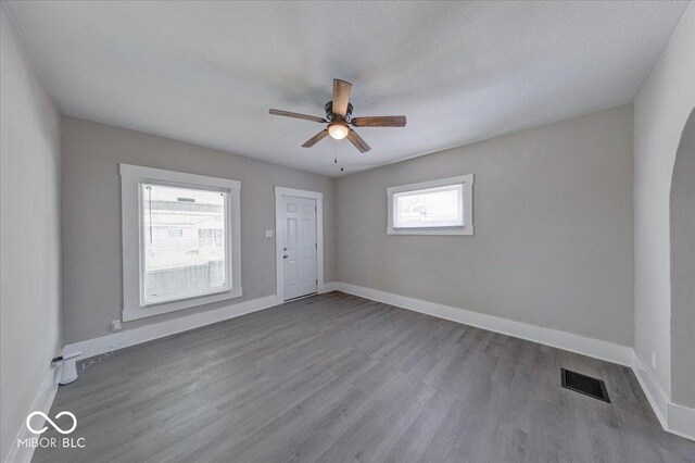 418 Eastern Ave, Indianapolis, IN 46201 - unfurnished room with a ceiling fan and wood finished floors