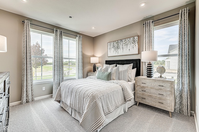 587 Bluestem Ln, New Whiteland, IN 46184 - bedroom featuring light carpet, baseboards, and recessed lighting