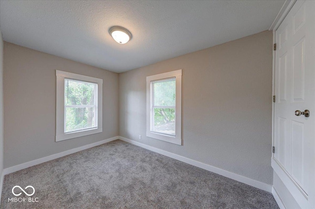 420 Eastern Ave, Indianapolis, IN 46201 - unfurnished room featuring carpet and a textured ceiling