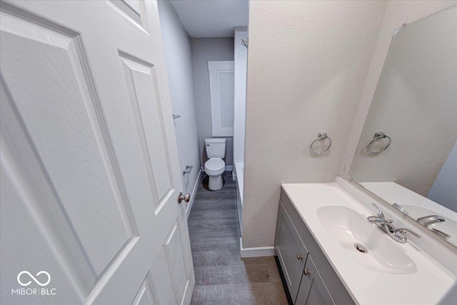 420 Eastern Ave, Indianapolis, IN 46201 - bathroom featuring vanity and a textured wall