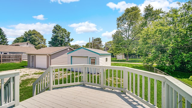 753 Walnut St, Franklin, IN 46131 - wooden terrace featuring a garage, an outbuilding, and a yard