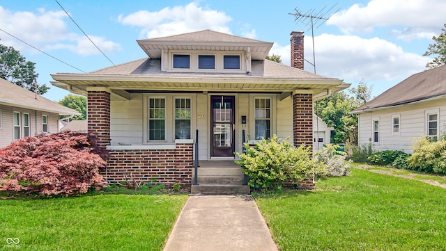 753 Walnut St, Franklin, IN 46131 - bungalow-style home featuring brick siding, covered porch, a front yard, and a chimney