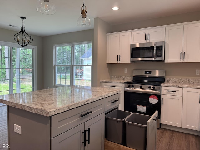 177 W Itawamba Trl, Greensburg, IN 47240 - kitchen featuring appliances with stainless steel finishes, dark wood-type flooring, pendant lighting, white cabinetry, and recessed lighting