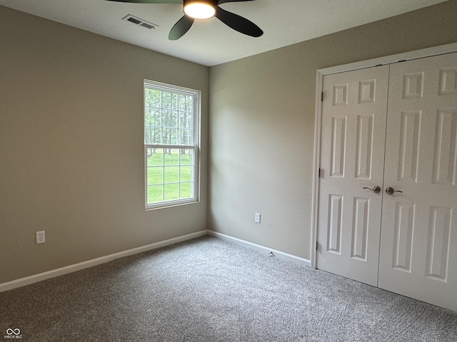 177 W Itawamba Trl, Greensburg, IN 47240 - unfurnished bedroom featuring carpet, multiple windows, and a closet