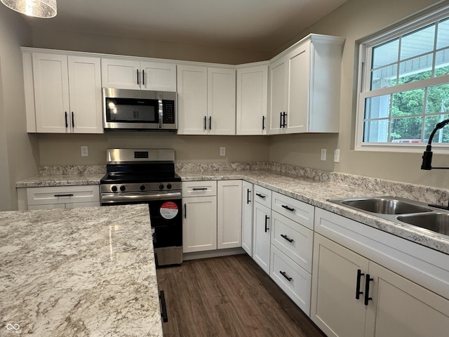 177 W Itawamba Trl, Greensburg, IN 47240 - kitchen featuring appliances with stainless steel finishes, a sink, white cabinets, and dark wood-type flooring