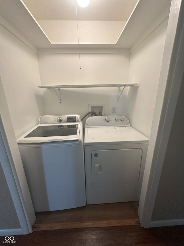 2180 N Irwin St, Indianapolis, IN 46219 - washroom with washer and clothes dryer and dark wood finished floors