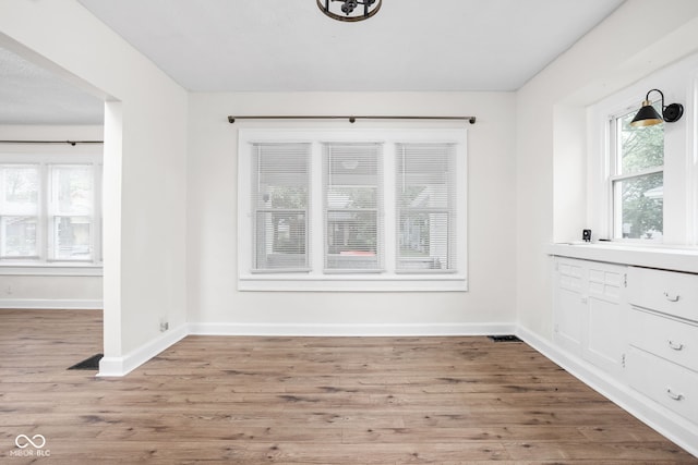 614 N Drexel Ave, Indianapolis, IN 46201 - unfurnished dining area with light wood finished floors and baseboards