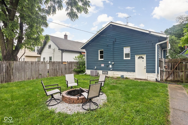 614 N Drexel Ave, Indianapolis, IN 46201 - rear view of house featuring a fire pit