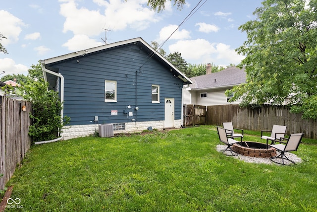 614 N Drexel Ave, Indianapolis, IN 46201 - rear view of house with a fire pit and central AC