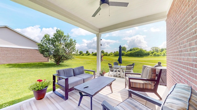 217 Saint Andrews Ave, Edinburgh, IN 46124 - deck with outdoor lounge area, a lawn, a ceiling fan, golf course view, and outdoor dining area